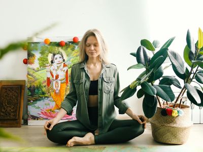 A person sitting in a calm meditative pose.